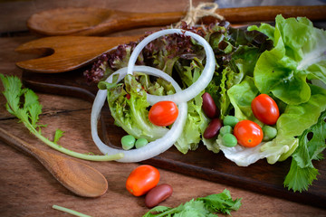 fresh hydroponic salad on wooden table