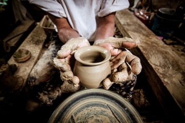 Fototapeta na wymiar Pottery clay by hand