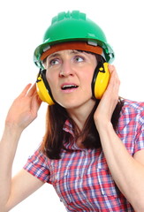Woman wearing protective helmet and headphones
