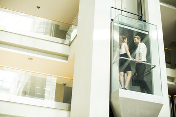 Man and woman in the elevator © BGStock72