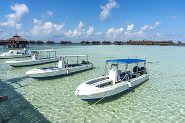 Fototapeta na wymiar Boats with beautiful beach