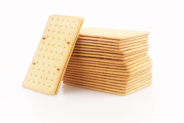 Biscuits or crackers on white background