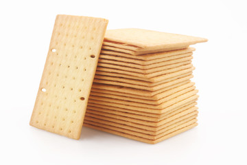 Biscuits or crackers on white background