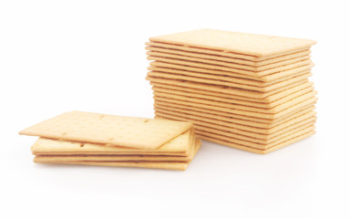Biscuits or crackers on white background