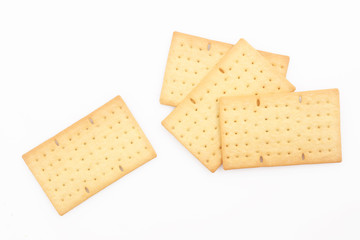 Biscuits or crackers on white background