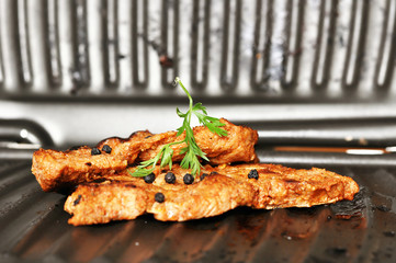 Pork meat on a grill