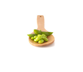 Green soya , Wooden spoon on white background.