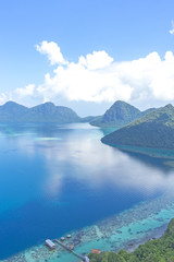 Fototapeta premium Aerial view of tropical island of Bohey Dulang near Siapdan Island, Sabah Borneo, Malaysia.