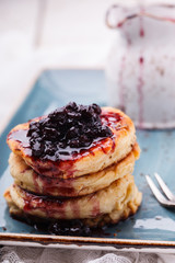 Cottage cheese pancakes with blueberry jam.selective focus