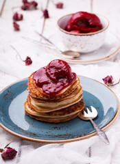 Cottage cheese pancakes with raspberry jam.selective focus..