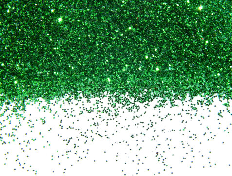 Fototapeta Green glitter sparkle on white background