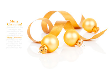 golden christmas decoration balls with satin ribbon, isolated on