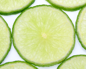slice of fresh lime olated on white background