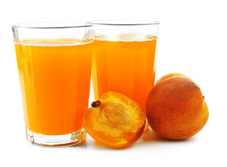 Peach juice in glass isolated on white