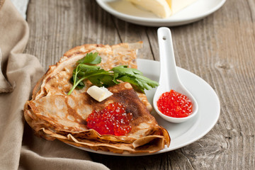 Red caviar and pancakes