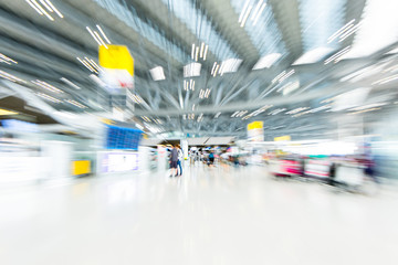 Blurred background : Motion zoom Traveler at airport terminal bl