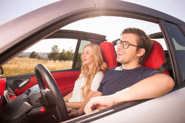 Cute loving couple is traveling by their transport