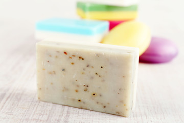Bars of natural soap on light background