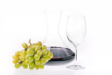 Red wine and grapes