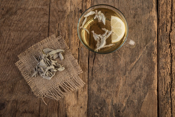 sage tea on wooden table