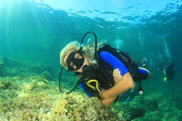 Foto auf Glas Blonde woman scuba diver © Richard Carey