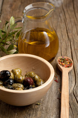Bowl with olives and olive oil
