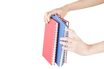 stack of notebooks colorful in hand.