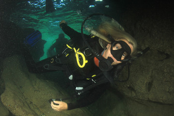 Blonde woman scuba diver