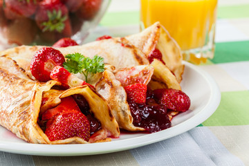 Traditional crepes served with strawberries