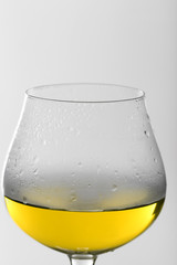 Glass of wine on grey background