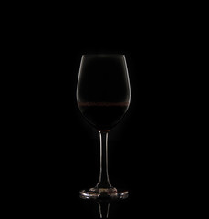Red wine in glasses isolated on white background