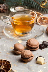 Chocolate macarons and cup of tea