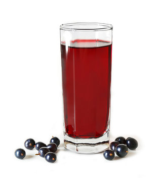 Glass of fresh blackcurrant juice isolated on white