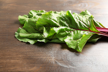 Fresh swiss chard on wooden table, close up