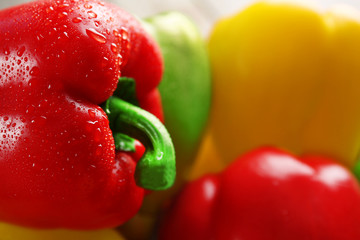 Group of wet colorful peppers, closeup
