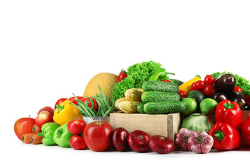 Composition with fresh fruits and vegetables isolated on white