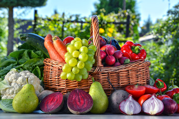 Obraz premium Fresh organic vegetables and fruits in the garden