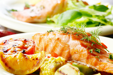 Fried salmon fillet with vegetables