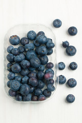 Box with fresh blueberry