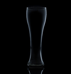 empty glass of beer isolated over black bsckground