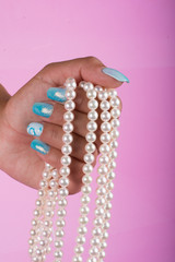  painted nails and pearls
