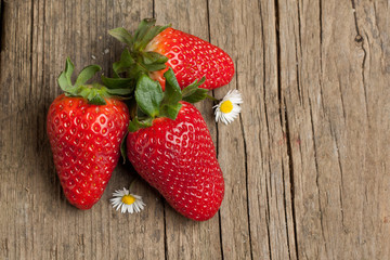 Three fresh strawberries