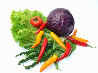 fresh vegetables and herbs isolated on black background