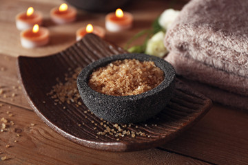 Beautiful spa composition with candles on wooden background