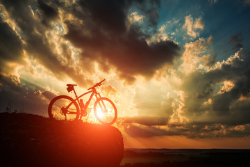Fototapeta premium Beautiful scene of bike on sunset