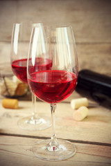 Still life of wine and bread on light background