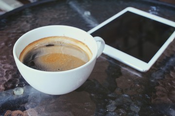 Hot coffee with tablet