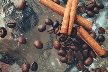 Roasted coffee beans and cinnamon