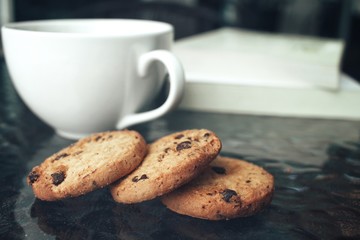 Hot coffee with chocolate cookies