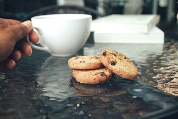 Hot coffee with chocolate cookies
